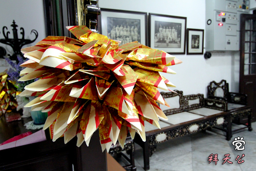 These folded Chinese joss papers would be burnt as an offering to Tian Gong