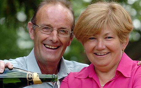 Keith Gough and his wife Louise from Bridgenorth, Shropshire, celebrating a £9 million Lotto windfall in 2005. Photo: PA 
