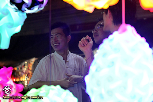 From left: Boon-Huat, Wee-Peng and Meng-Hong at the puzzle lamps stall
