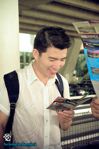 Boon-Huat was reading the Bangkok guide