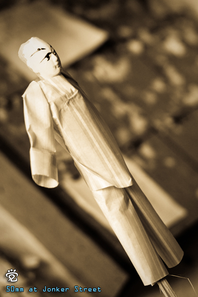 Paper-man, a decoration of paper offerings