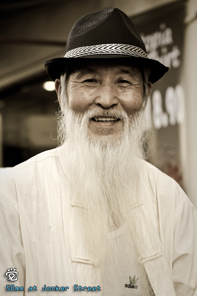 white beard friendly uncle sitting at Jonker Street