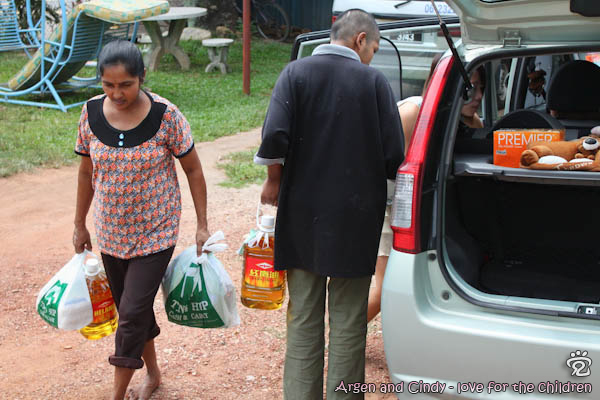 the staff and patient helping to unload