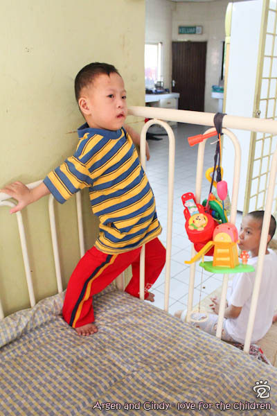 Boy-boy in the baby crib
