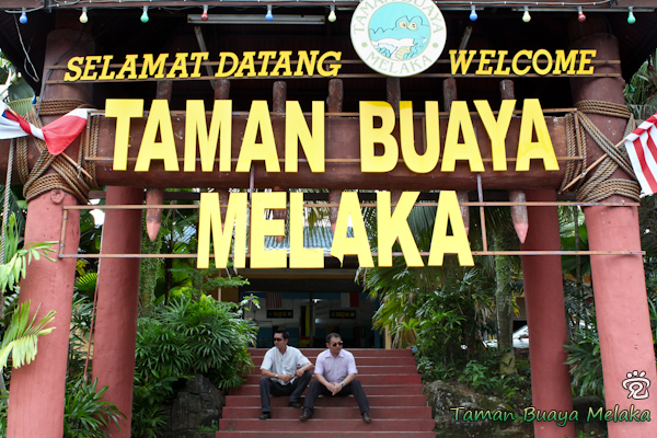 at the entrance of the Melaka Crocodile Park, from left: Stephen and Henry