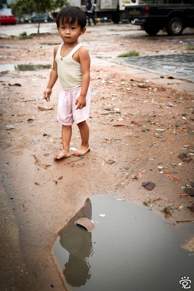 barefooted Khmer kid