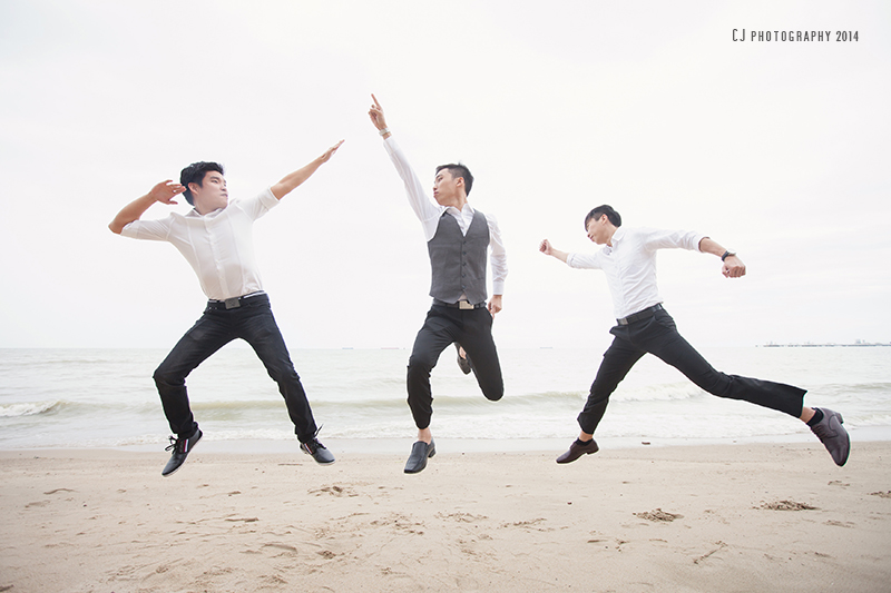 Groomsmen and groom's jump shot