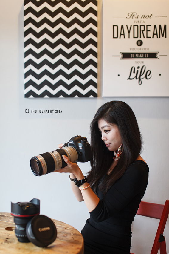 Vna with her favorite camera (shot with Canon EOS 5D Mark II with Sigma's 50mm f/1.4 EX DG HSM lens)