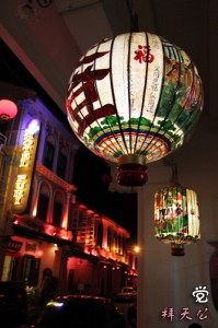 Traditional Chinese family lanterns hanging on the house of the first Baba family I visited for Bai Tian Gong
