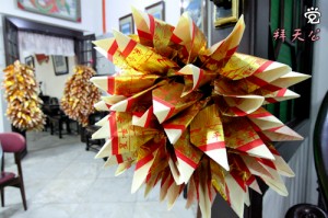 Chinese joss paper folded nicely in shape and hanging everywhere of the house