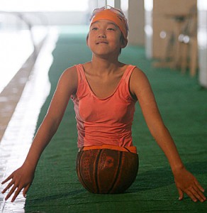 Qian Hongyan, who was forced to use half a basketball as her prosthetic body, has inspired millions recently with her ambition to compete as a swimmer in the 2012 Paralympics in London.