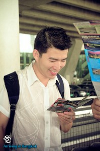 Boon-Huat was reading the Bangkok guide