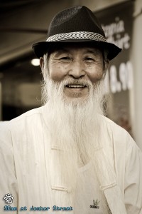 white beard friendly uncle sitting at Jonker Street