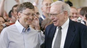 Bill Gates, left, and Warren Buffett, seen in this 2007 photo during the annual Berkshire Hathaway shareholders meeting in Omaha, are trying to persuade other American billionaires to give at least half their wealth to charity.