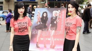 Jess and Lisa Origliasso of The Veronicas at a public event unveiling their new PETA ad. (Photo: Brendon Thorne/Getty)