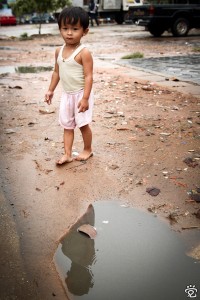 barefooted Khmer kid