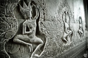 dancing ladies carved in relief on the walls of the temple