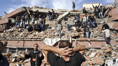 The quake caused several buildings in Ercis to collapse, trapping an unknown number of citizens in the debris.