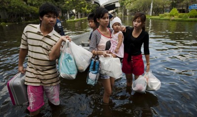 Local residents evacuate their neighbourhood in Bangkok (photo from news.sky.com)