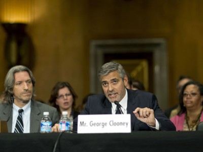 Clooney testifies during a Senate Foreign Relations Committee hearing next to John Prendergast, co-founder of the Satellite Sentinel Project, regarding Sudan at the Dirksen Senate Office Building in Washington Wednesday. (photo: REUTERS/Benjamin Myers)