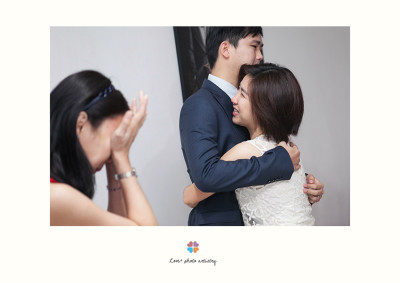 Hugs from groom's sisters