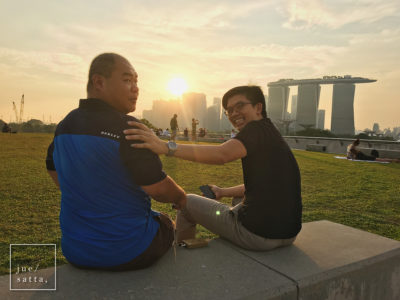 Henry (left) and Koh Yiaw enjoying sunset at the rooftop park of Marina Barrage